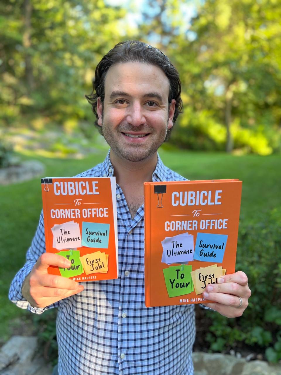Mike Halpert with copies of Cubicle To Corner Office